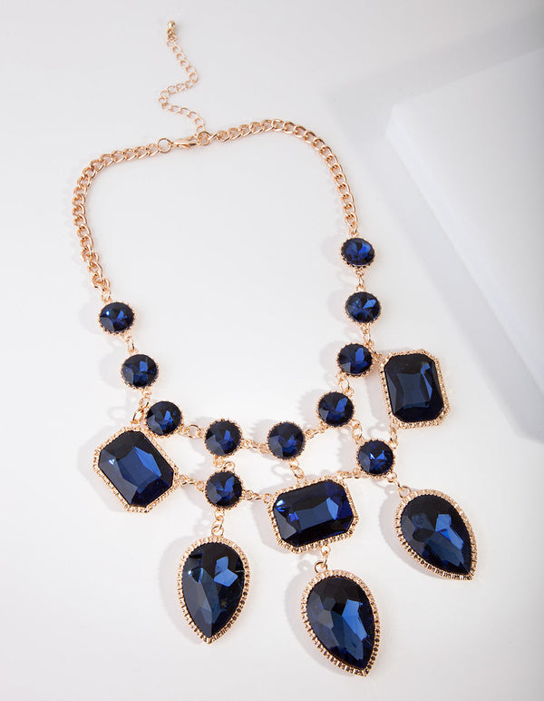 Gouden ketting met blauwe stenen