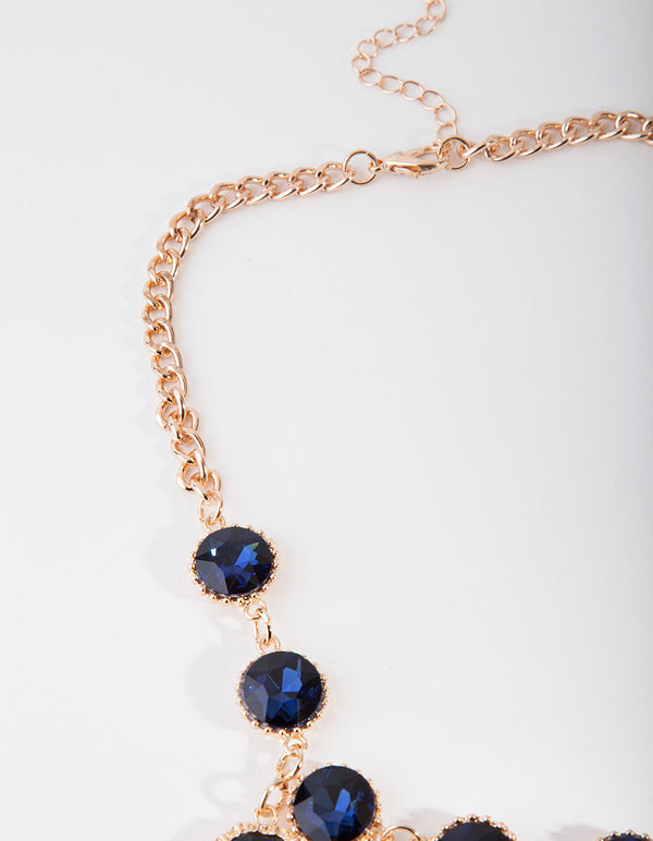 Gouden ketting met blauwe stenen