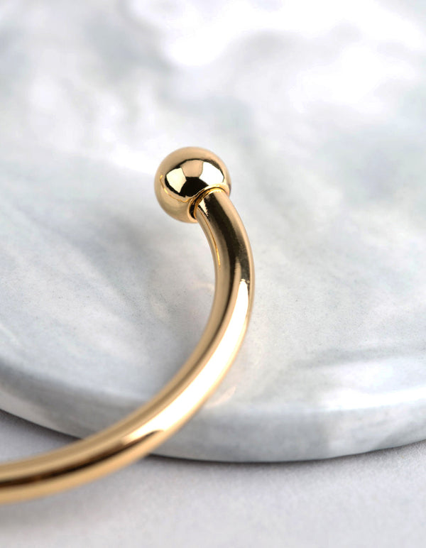 Bransoleta mankietowa z mosiądzu platerowanego 18-karatowym złotem i kulką