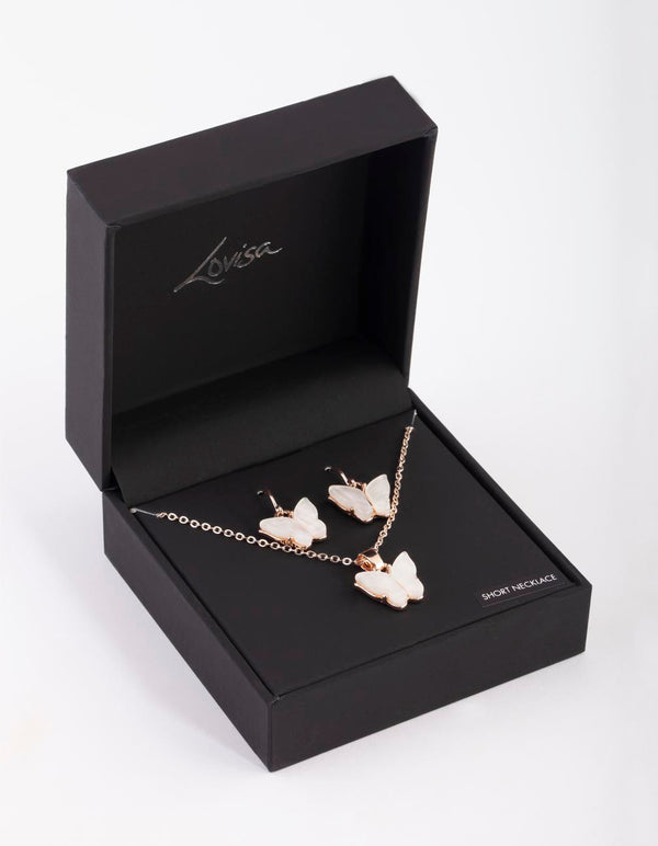 Set van roségouden vlinderketting en oorbellen