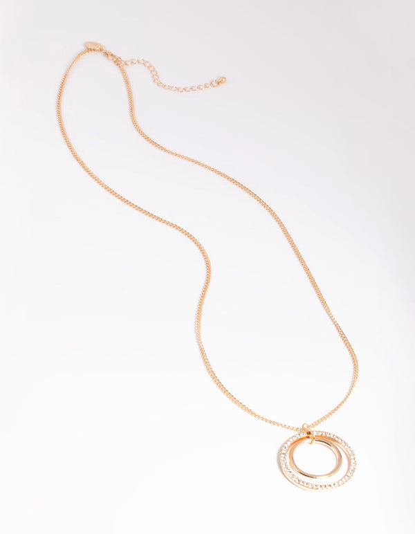 Lange ketting met gouden cirkel en diamanten