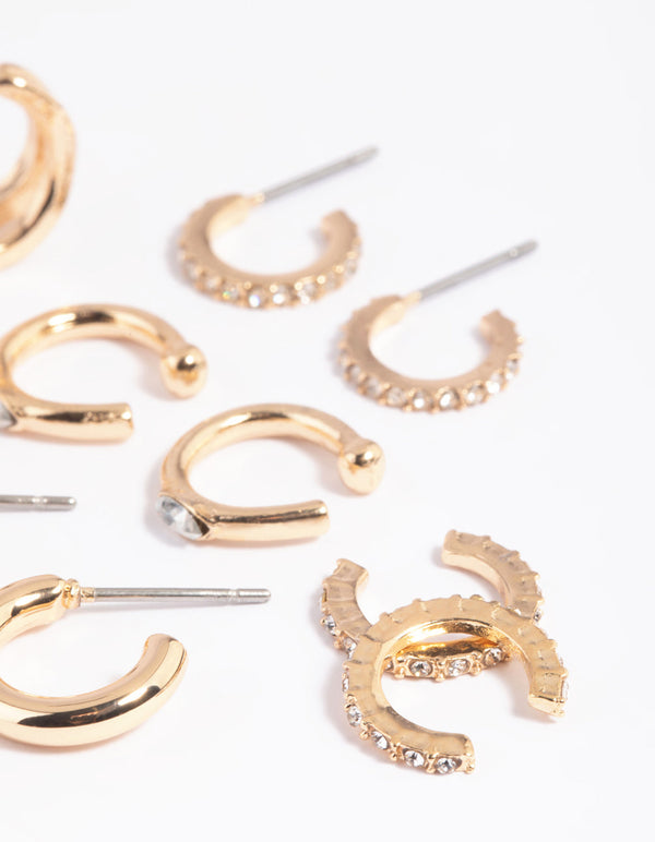 Stapelpakket met gouden diamanten manchet en Huggie-oorbellen
