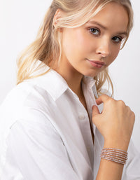 Armband met meerdere rijen roségouden diamanten - link has visual effect only