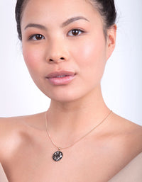 Black Gold Moon Phase Necklace - link has visual effect only