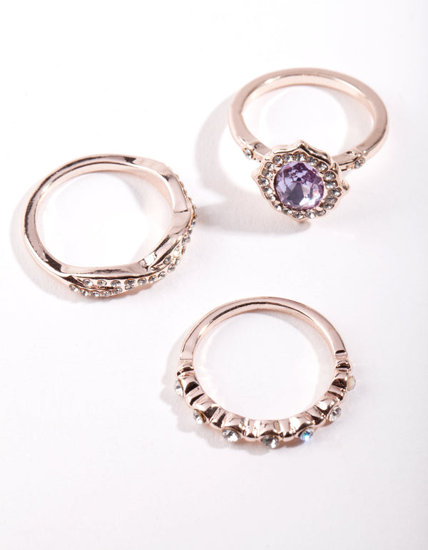 Pierścień z różowego złota z fioletowymi kamieniami