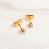 Studex 4mm Cubic Zirconia 24K lichtgouden oorknop - link has visual effect only