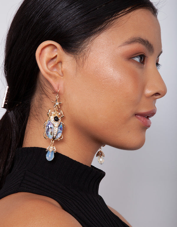 Gold Blue Swirl Beetle Earrings