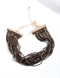 Zwarte en gouden dia-cut kettingarmband - link has visual effect only
