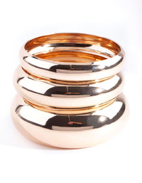 Gouden gepolijste statement bangle stapel - link has visual effect only