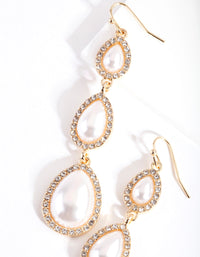 Gouden oorbellen met parels - link has visual effect only