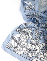 Lichtblauwe bloemenbandana-haarsjaal - link has visual effect only