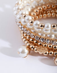 Złota bransoletka z pereł i diamentów, rozciągliwa, 7 sztuk - link has visual effect only