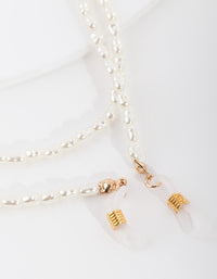 Gouden parel zonnebrilketting - link has visual effect only