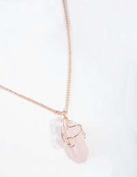 Ketting met gekrulde rozenkwarts en roségouden steen - link has visual effect only