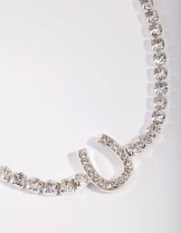 Bransoletka z łańcuszkiem w kształcie srebrnej podkowy - link has visual effect only