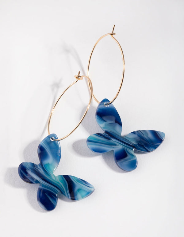Srebrne akrylowe kolczyki koła z motylami