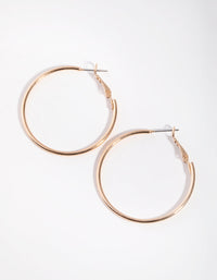 Gold Medium Core Hoop Earrings - link has visual effect only