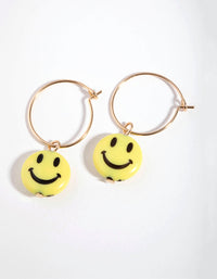 Złote kolczyki Smiley Huggie - link has visual effect only