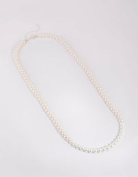 Long Classic Pearl Necklace - link has visual effect only