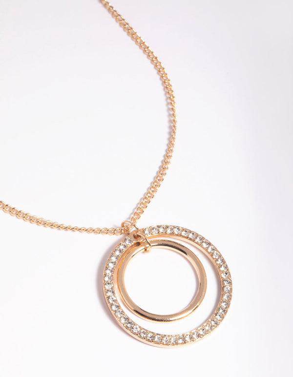 Lange ketting met gouden cirkel en diamanten
