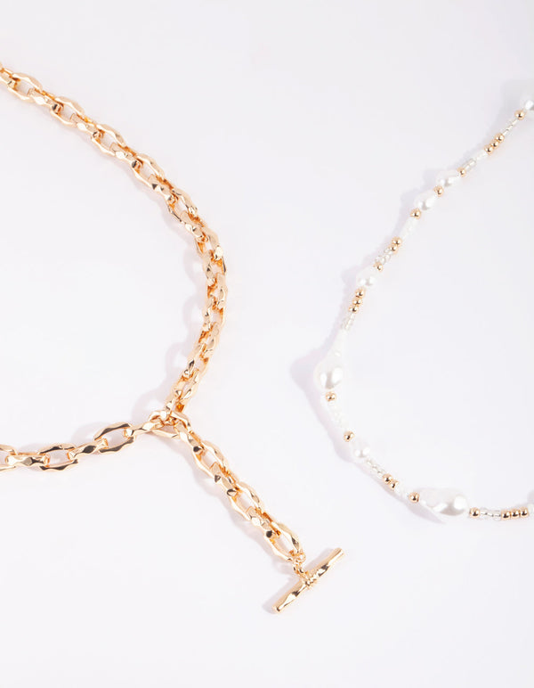 Gouden en witte parelketting