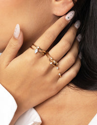 Vergulde ringstapelset met zoetwaterparels - link has visual effect only