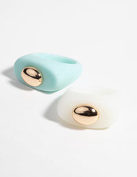 Witte en turquoise ringen uit de jaren 90 - link has visual effect only