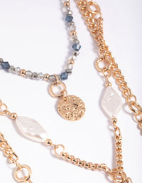 Gold Molten Disc and Pearl Layered Necklace - link has visual effect only
