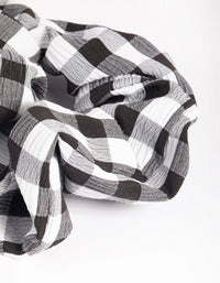 Zwart-wit geruite scrunchie - link has visual effect only
