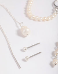 Stapelpakket met oorbellen van verzilverde parelketting - link has visual effect only