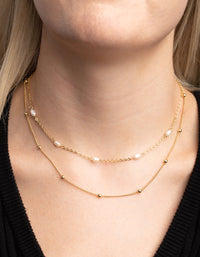 Naszyjnik z warstwowymi perłami słodkowodnymi w kolorze złotym - link has visual effect only
