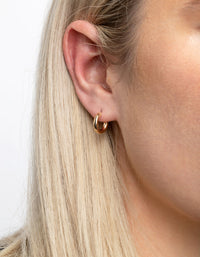 Stapelpakket met gouden diamanten manchet en Huggie-oorbellen - link has visual effect only