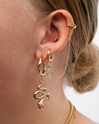 Gouden slang mini hoepel oorbellen - link has visual effect only