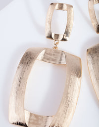 Gouden getextureerde open geometrische oorbellen - link has visual effect only